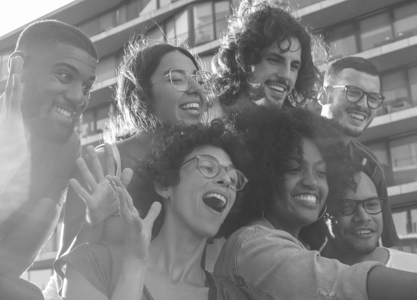 joyful-multiethnic-friends-taking-funny-group-selfie 1